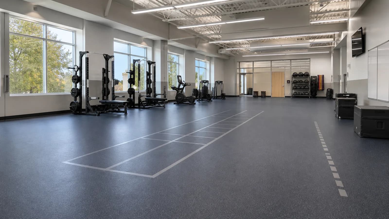 Modern school conditioning room with resilient sports flooring