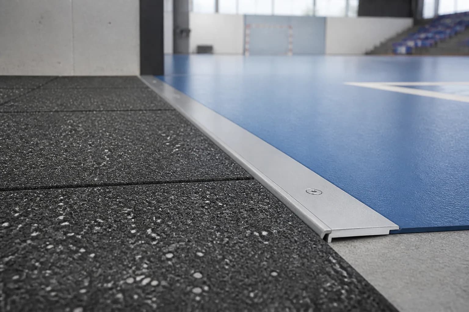 Indoor-outdoor community sports and recreation center: material texture, scale and seam detail using multi-system public-facility specification using sports rolls and rubber tiles