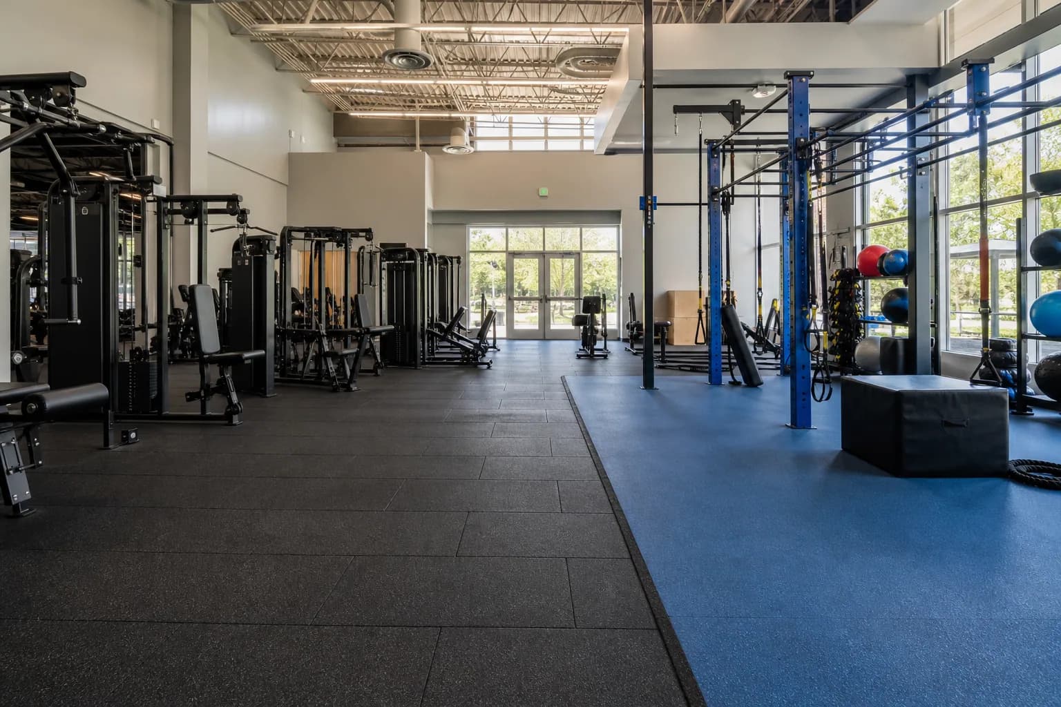 Indoor-outdoor community sports and recreation center: primary training zone and equipment interface using multi-system public-facility specification using sports rolls and rubber tiles