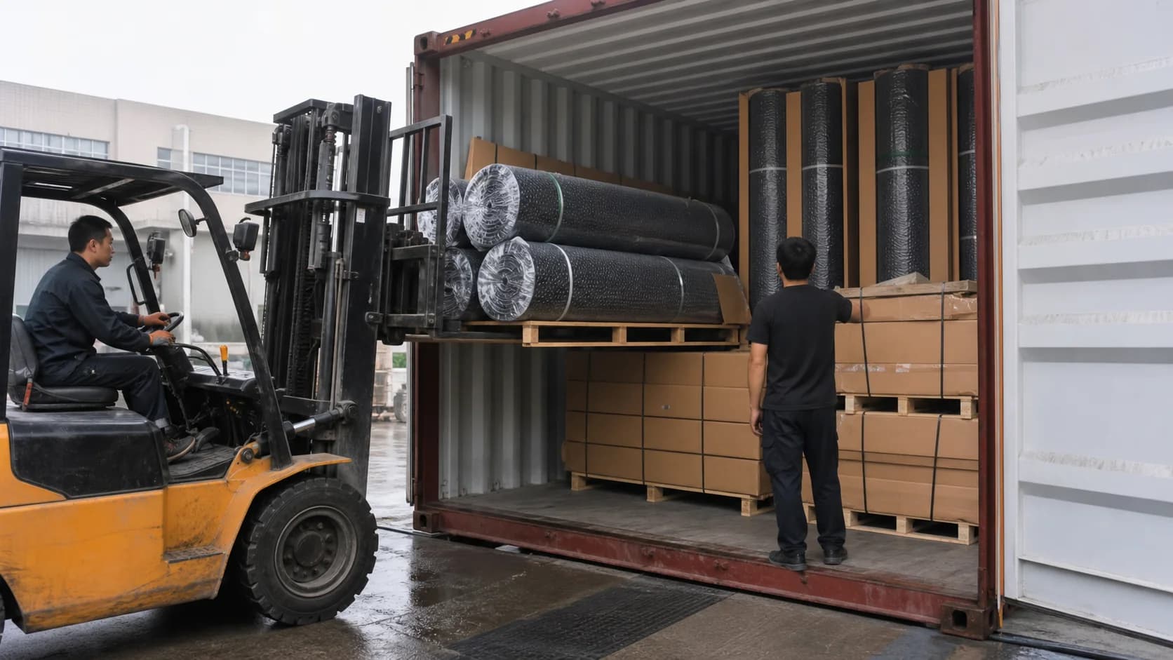 Forklift loading wrapped rubber flooring rolls and boxed tiles into a shipping container