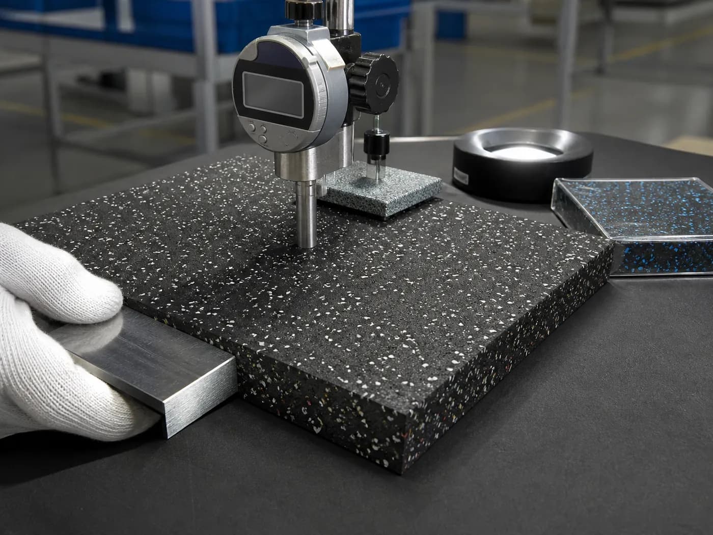 Gym flooring tile at an industrial thickness and dimension inspection station