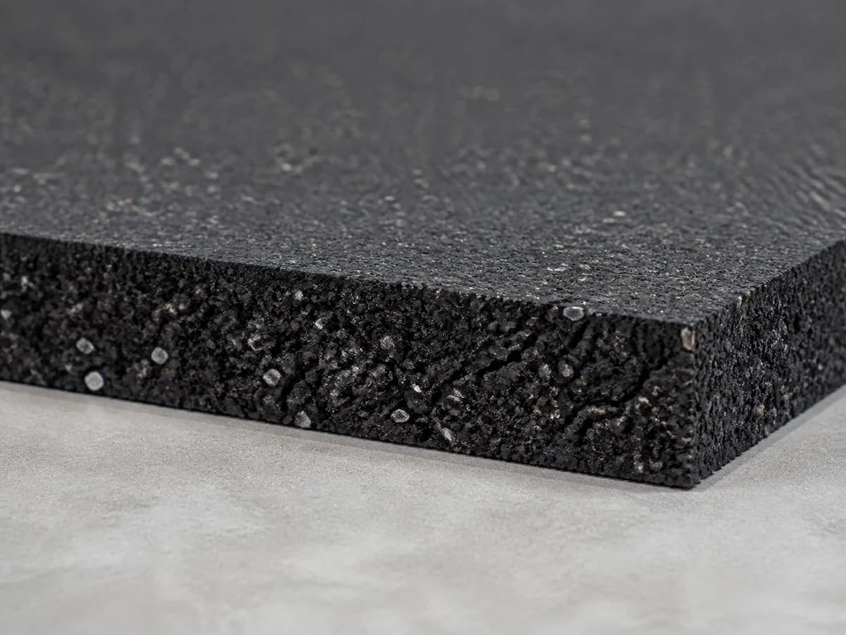 Dense rubber flooring granules and clean material edge