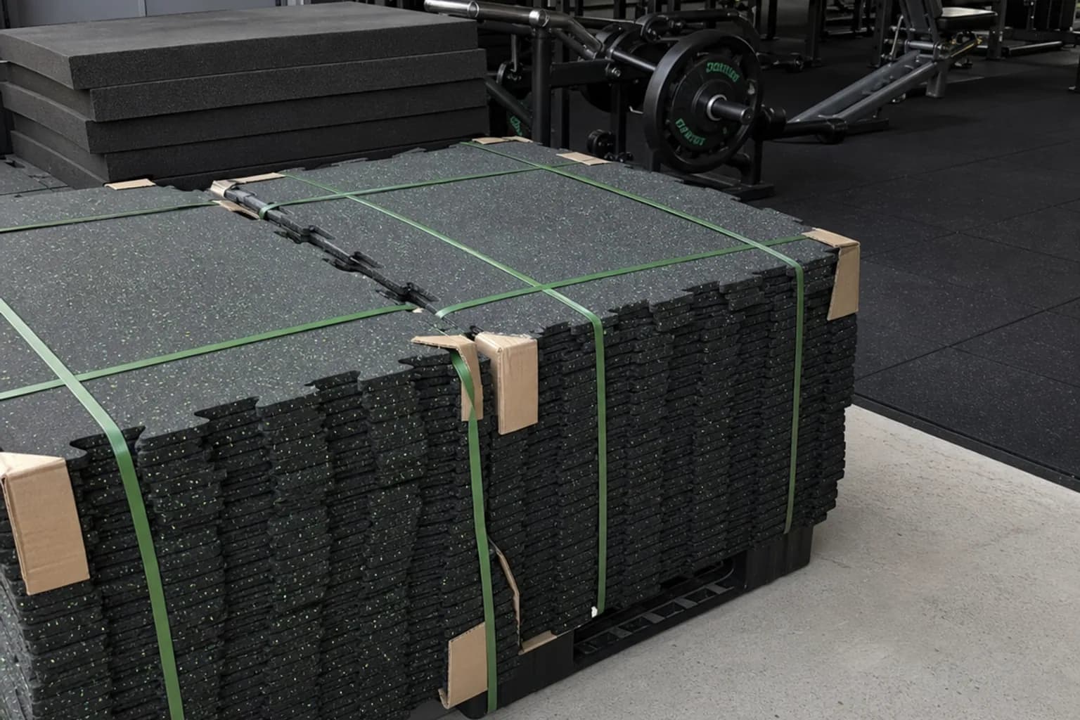 Mid-size neighborhood commercial gym: product, packing or project material coordination using commercial interlocking rubber tiles with local heavier protection